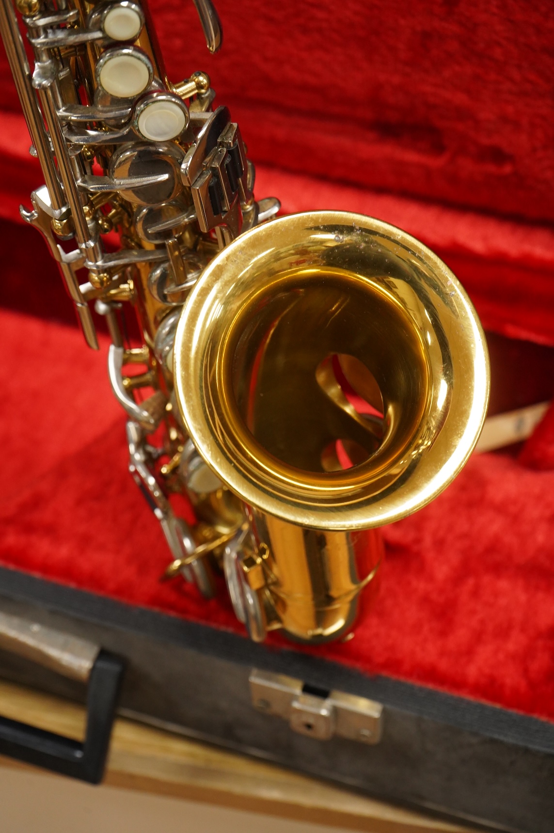 A cased Borgani soprano saxophone